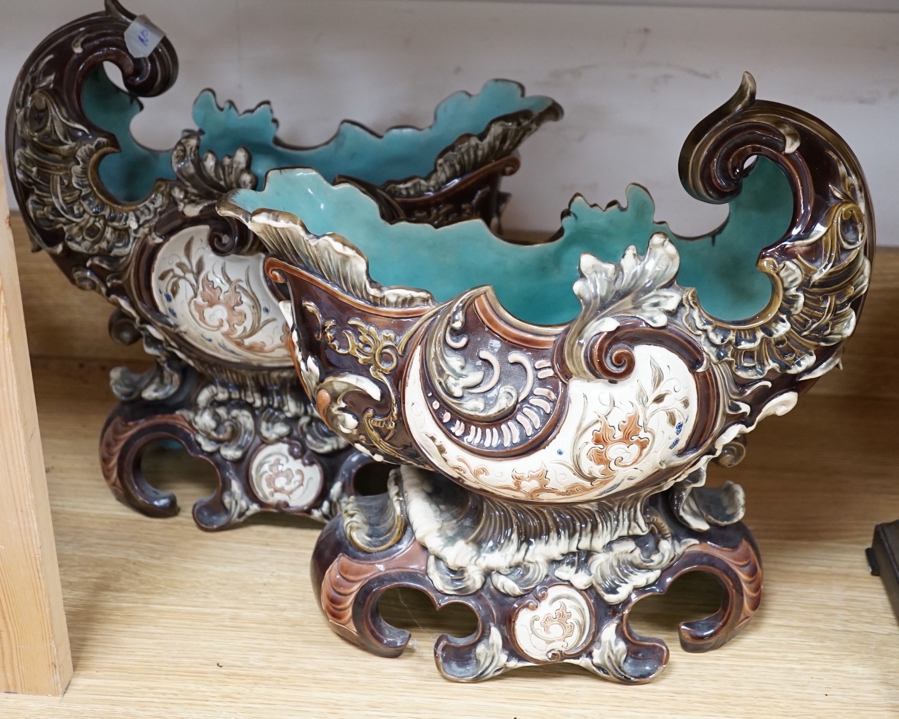 A pair of Continental majolica shell shaped vases, c.1900, 33cm